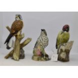 Three Mack bone china statues including;