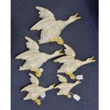 Beswick Mallard wall plaques; numbers 596-0, 596-1, 596-2, 596-3, 596-4, white with yellow beaks,