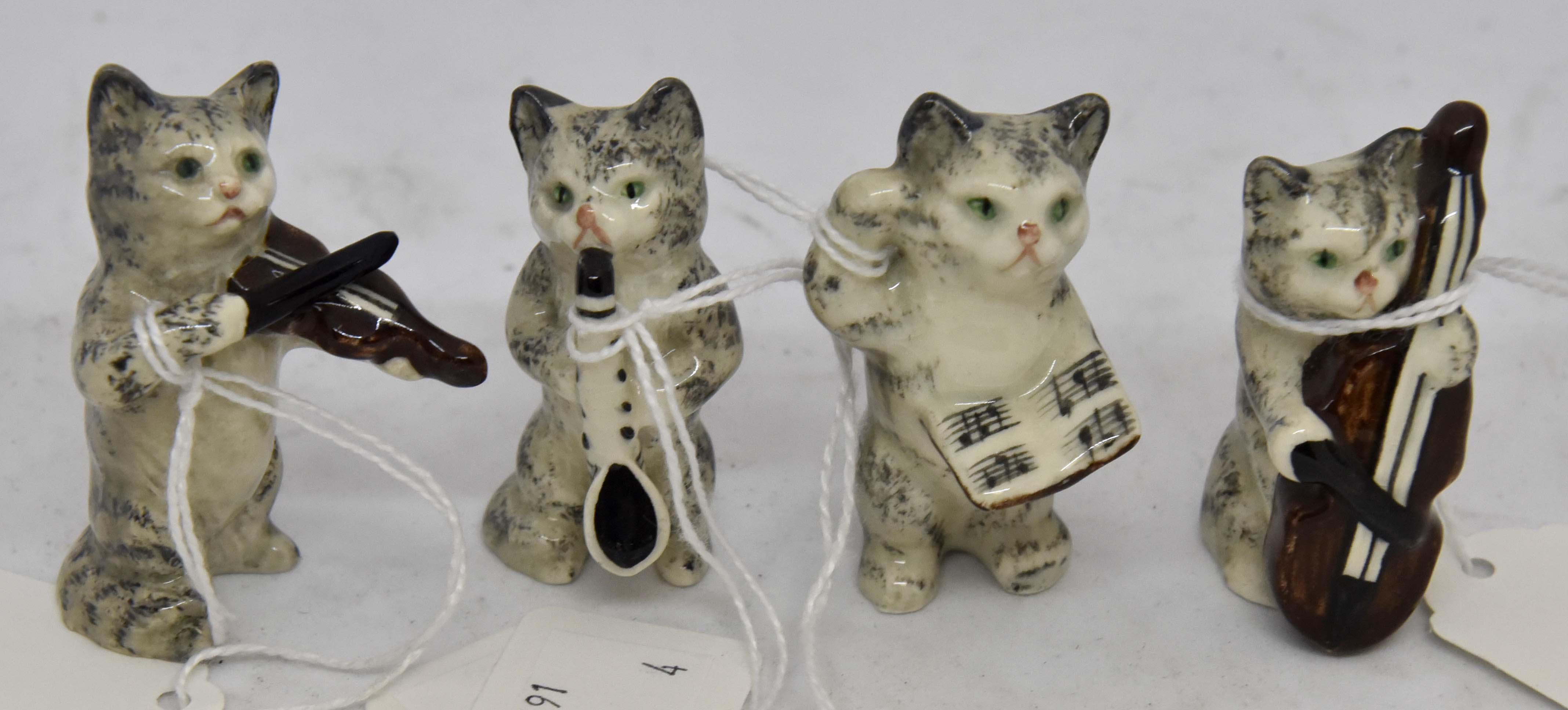 Group of four miniature Beswick Muskian Cats