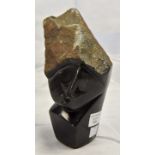 A mid to late 20th Century soapstone figure,