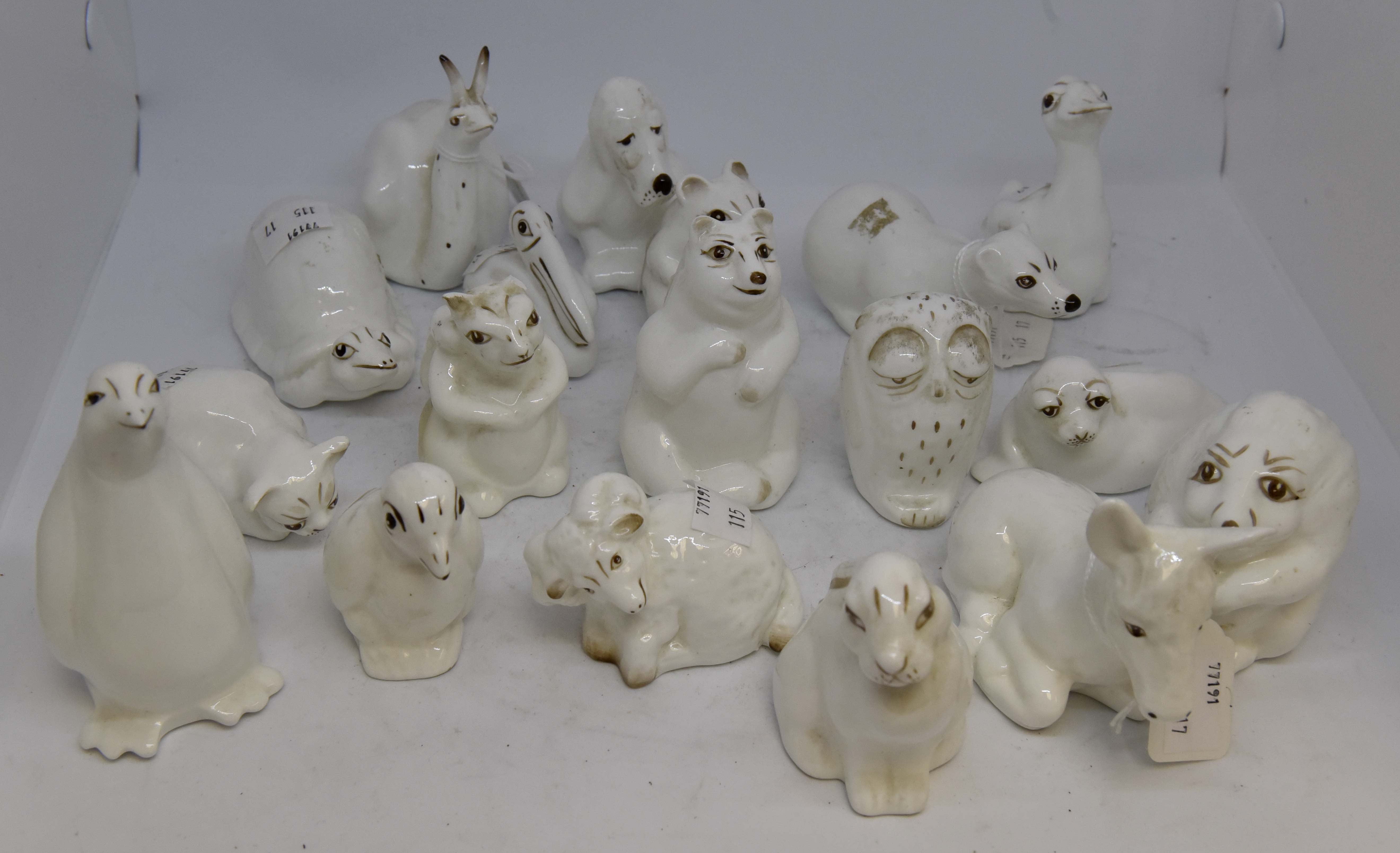 Coalport white glazed animal figures to include; Pelican, Penguin, Ram,