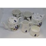 A group of late 20th Century Coalport Paddington Bear teaset items, including two teapots, milk jug,