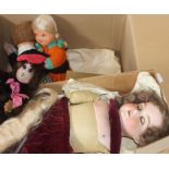 A collection of vintage toys including Bisque doll, dolls and a monkey