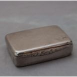 A silver rectangular snuff box, by D. Bros, assayed Birmingham 1960, having hinged lid with shaped