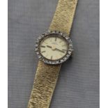 A Girard-Perregaux 18ct. yellow gold and diamond set ladies' bracelet watch, manual movement, having