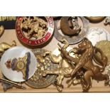 Militaria interest; A collection of cap badges. (qty)