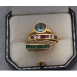 An 18ct. gold and aquamarine ring, bezel set round cut aquamarine, shank impressed "750", (gross