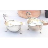 A pair of silver sauce boats, by  S Blanckensee & Son Ltd, Birmingham 1929 and 1932, with flying