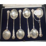 A Victorian cased Albany pattern silver teaspoon, sugar tong and sifting spoon set, by John &