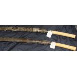 Two 19th century Burmese sword Dha, each having slightly curved single edge blade swollen to tip,