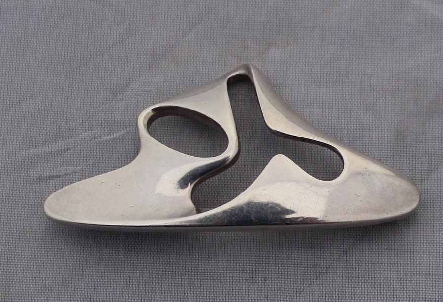 A Georg Jensen "Amoeba" sterling silver brooch, No.325, designed by Henning Koppel for Georg Jensen,