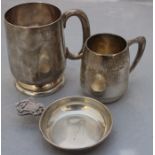 A silver tankard, assayed Birmingham 1934, makers mark rubbed, of circular tapering form, with