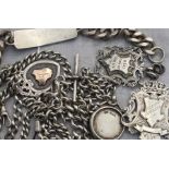 A silver double Albert chain, curb link, length 46cm, suspending a silver medal by Thomas Fattorini,