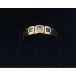 A Victorian 18ct. yellow gold, diamond and sapphire ring, set central old round cut diamond