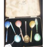 A cased set of six silver gilt and guilloche enamel spoons, by Walker & Hall, assayed Chester