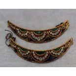 A Turkish yellow metal, enamel and stone set collar set?, of shallow crescent form, decorated with
