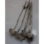 A set of six white metal mate straws/spoons, 20th century, each having long tubular stem/straw, with