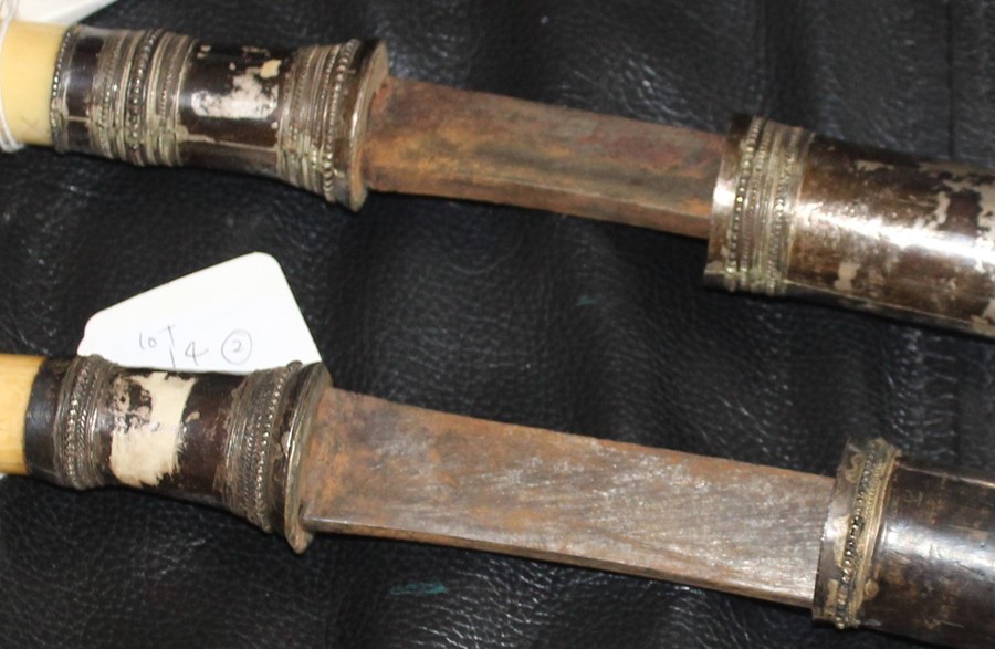 Two 19th century Burmese sword Dha, each having slightly curved single edge blade swollen to tip, - Image 2 of 2