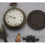 A WWI pocket watch, crown wind, 55mm cupro-brass case cast to face "Honnuer a la France et aux