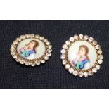 A pair of Victorian enamelled circular buttons, each having enamelled hand painted portraits of a
