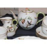 A Herend tea set comprising teapot cups and saucers jug and sugar bowl, perfect condition to all
