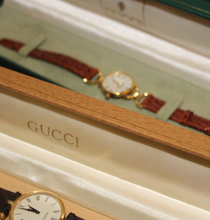 Two Gucci ladies' wristwatches, quartz movement, to original Gucci straps in Gucci boxes, together