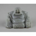 A Chinese carved white marble seated Budai, height 5.5cm.