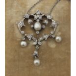 A Belle Epoque precious white and yellow metal, pearl and diamond pendant necklace, of open work