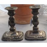 A pair of silver candlesticks, by Thomas Arthur Reid, Francis James Langford & Christian Leopold