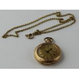 A 14ct. yellow gold ladies' pocket watch, crown wind, having textured gold dial with Roman numeral
