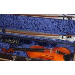 A Cased full size violin 4/4 Arthur Teller and Nurnberger violin bow and another bow