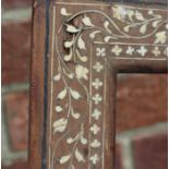 An indian wooden screen A.F and similar frame