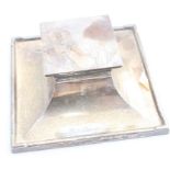 A silver inkwell, by Munsey & co Ltd, assayed Birmingham 1931, of square form with hinged and