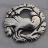 A Georg Jensen sterling silver "Dove" brooch, No.70, of near circular form, cast and pierced as a
