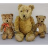 Three vintage Teddy bears including a large Chiltern bear, possibly Hugmee