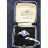 An 18ct. yellow gold, diamond and sapphire ring, set central old round cut diamond to within