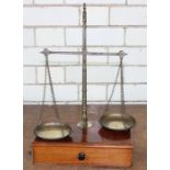 **REOFFER HANSONS ETWALL SALE 50/100**A late 19th century mahogany and brass set of beam scales,