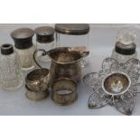 A small collection of silver ware, to include; silver circular napkin rings, various dates and
