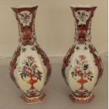 A pair of 18th century Chinese famille rose hexagonal vases, fitting to rims, H.30cm.