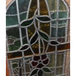 A large collection of early 20th century stained glass panels. (qty)