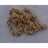 A textured gilt metal rope chain, length 81cm.