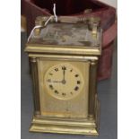 A brass repeater carriage clock, late 19th/early 20th century, gong strike, having Roman numeral