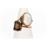 A 9ct gold smoky quartz ring, claw set emerald cut stone, size N, along with a 9ct gold and oval