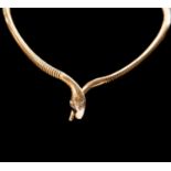 A 9ct gold and diamond serpent necklace, comprising snake head with diamond set eyes to snake link