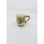 A Grainger Worcester mug, blush ivory decorated with berries and a twig handle. Date 1839 - 60