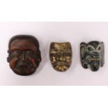 Three Japanese masks made of one bronze, one jadite and one Smiling man  bamboo.