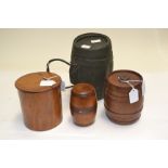 Four treen barrel shaped vessels, to include a cylinder tea caddy (4)