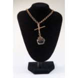 A 9ct rose gold double Albert chain with quartz swivel fob, length approx 15'', two swivel clasp and