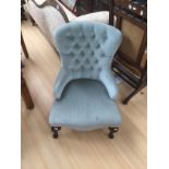 Blue velvet button back ladies chair.