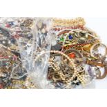 A collection of costume jewellery, watches including faux pearl necklaces etc (Q)